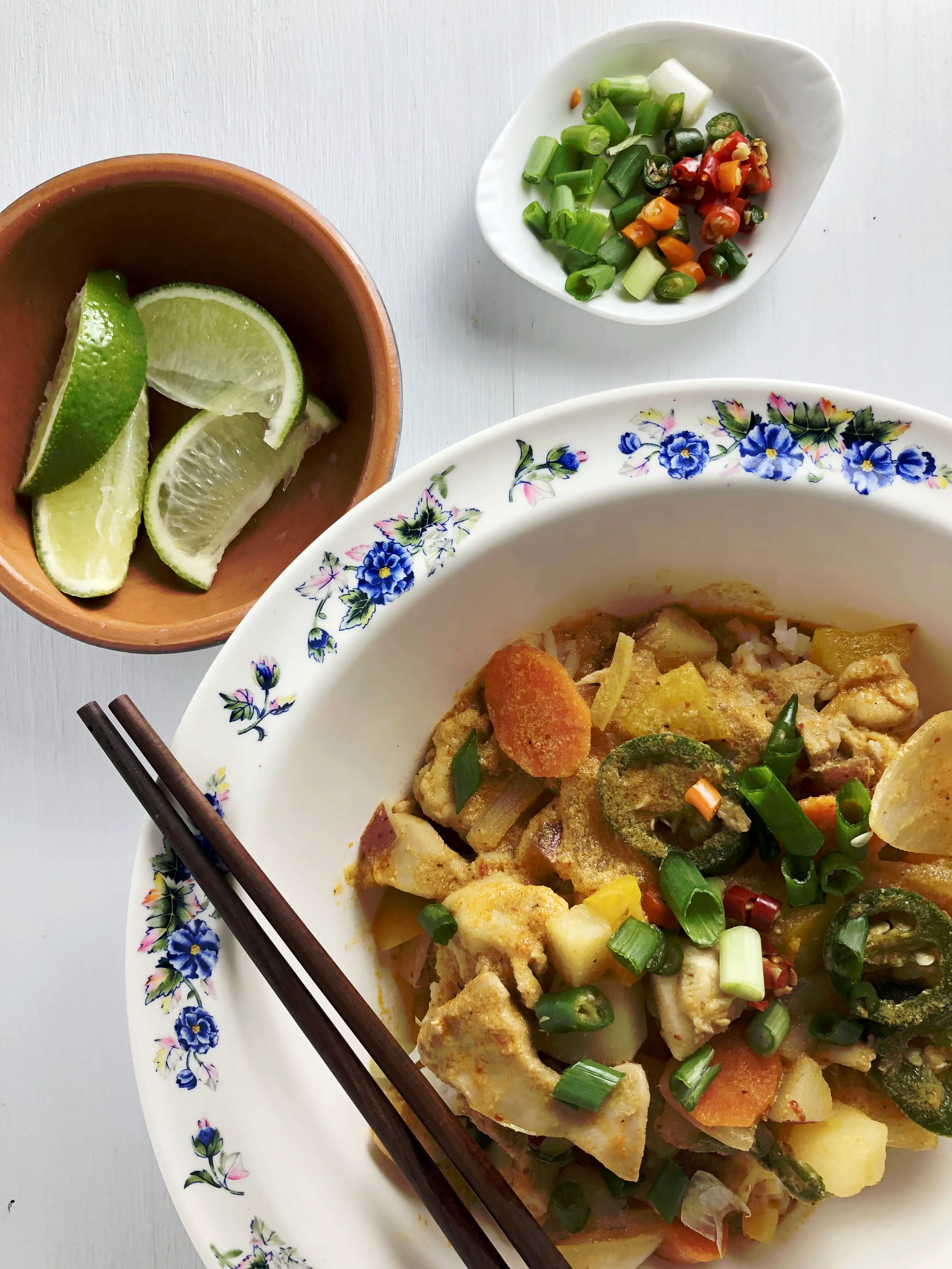 Thai Red Curry with limes, green onions, and chilis