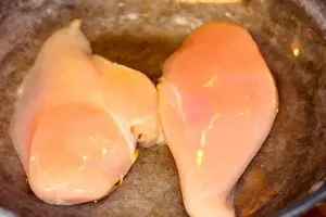 Poaching chicken breasts