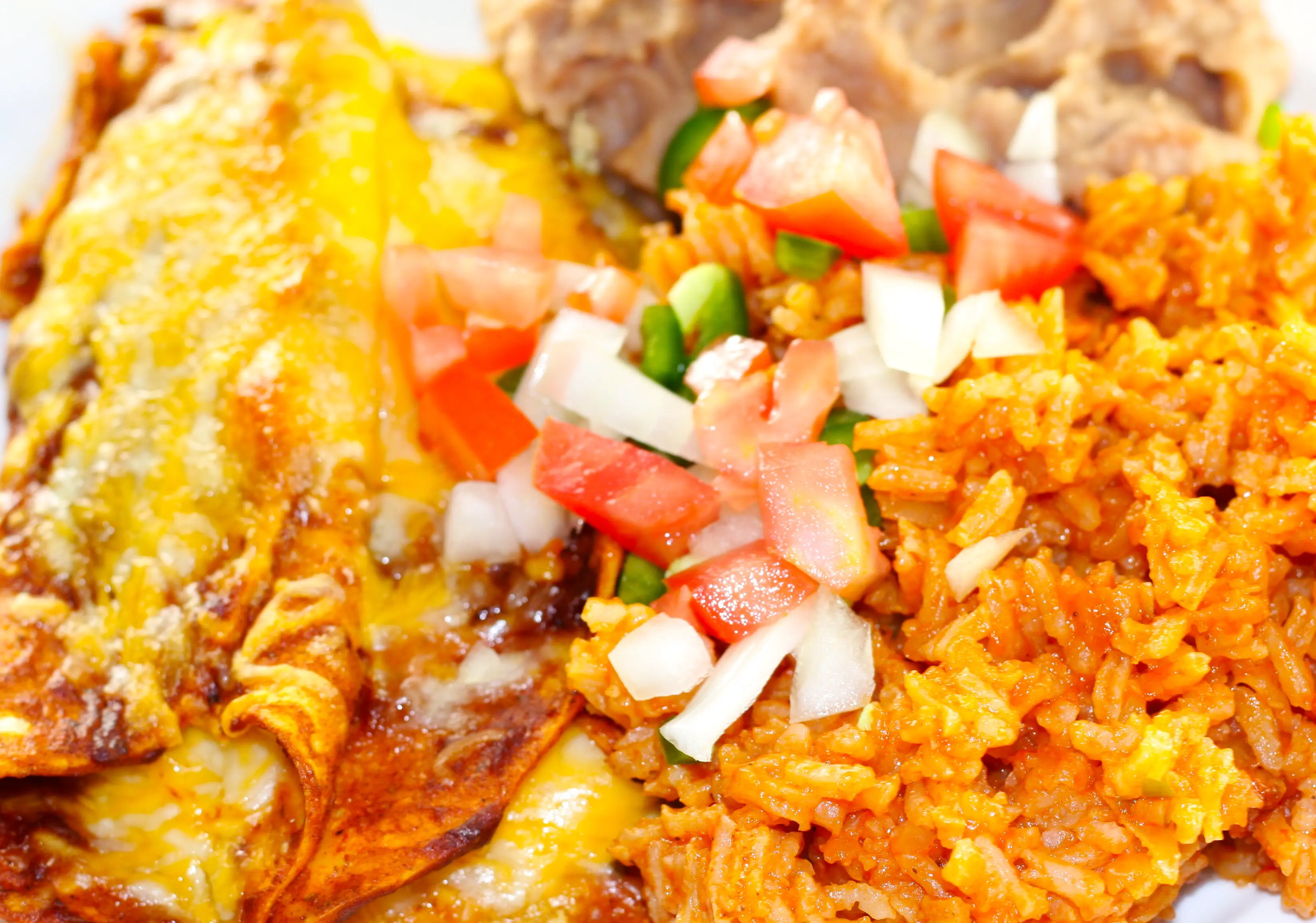Red Cheese Enchiladas, refried beans and spicy mexican rice