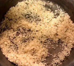 rice and oil in saucepan