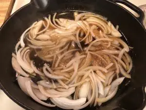 onions simmering in broth
