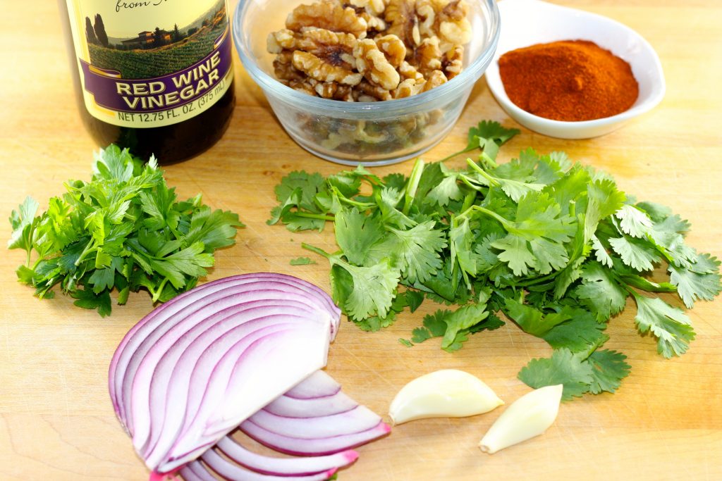 Red onion, garlic, parsley, cilantro, walnuts, red wine vinegar, paprika