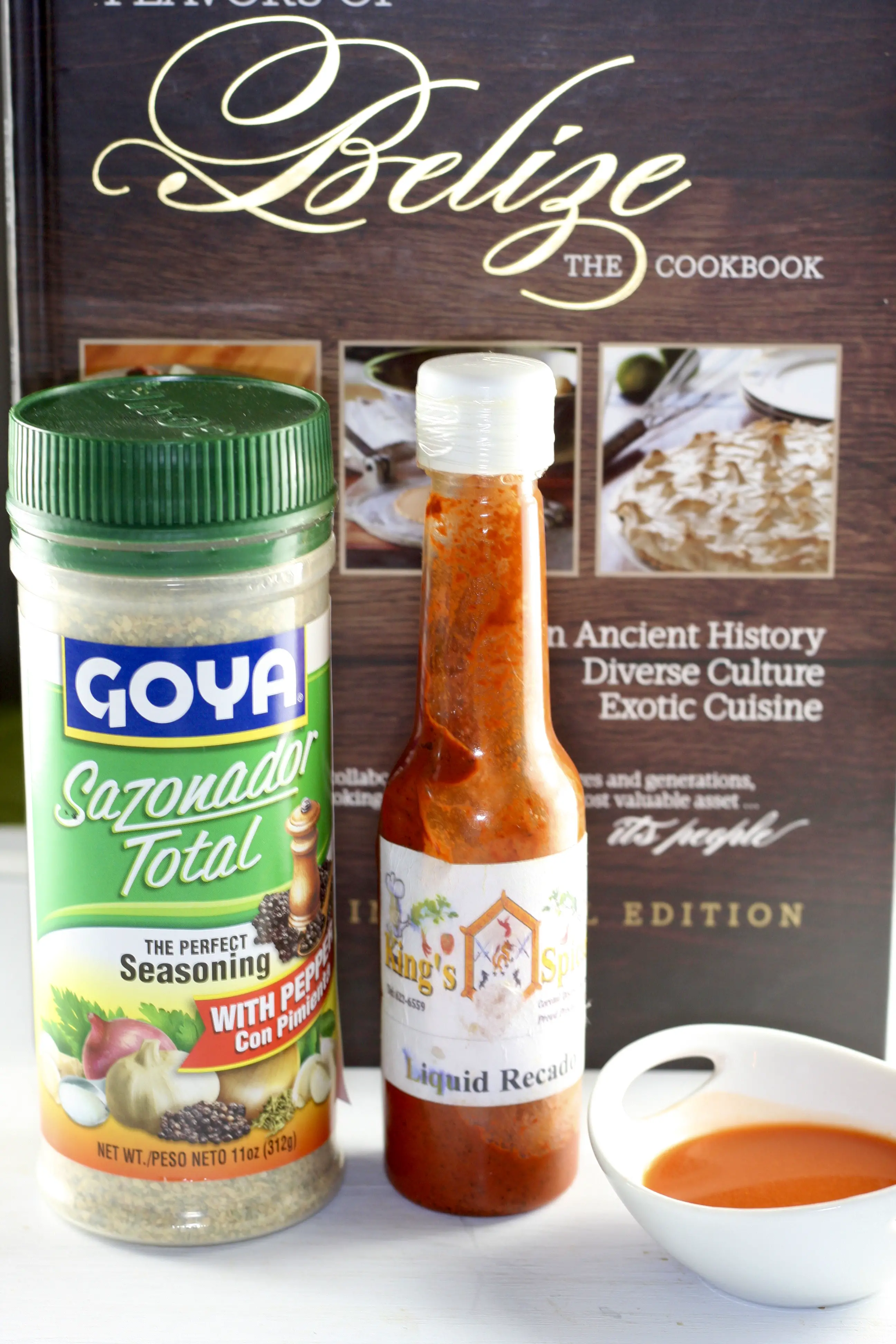 Goya Sazonador Total, Belizean Cookbook, and Red Liquid Recado