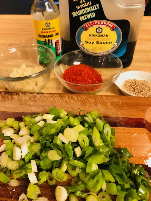 Green onions, korean red pepper powder, soy sauce, sesame oil, sesame seeds, and garlic