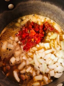 onions, beans, diced tomatoes and broth in a pot