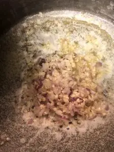 minced garlic and shallot in melted butter