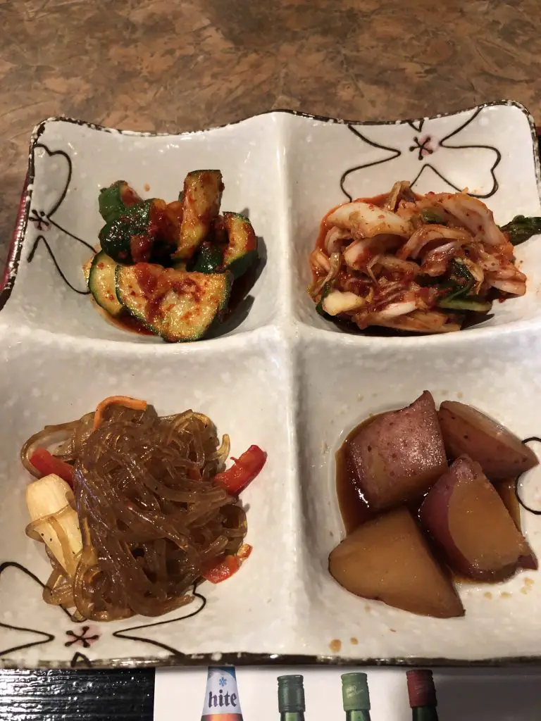 Kim's Galbi Banchan potato, cucumber, kimchi, and glass noodles