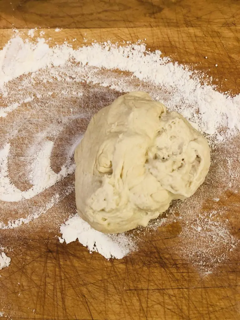 ball of dough and flour