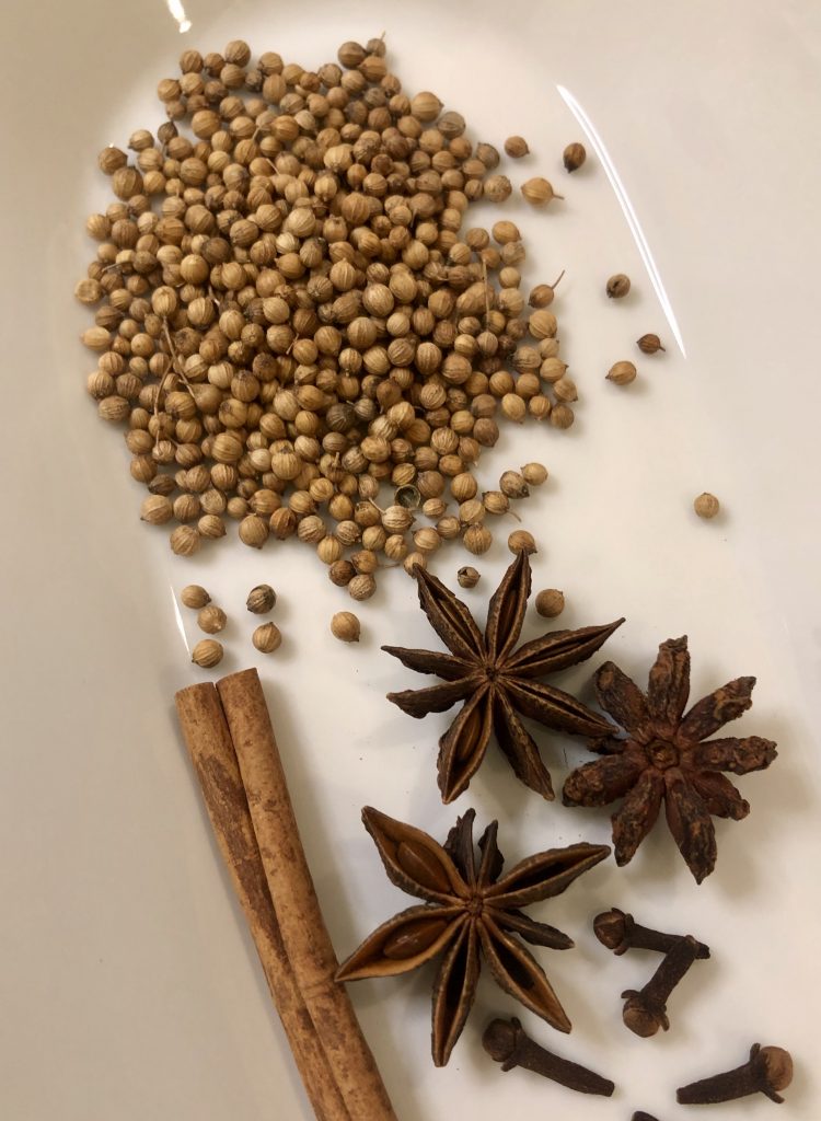 Coriander seed, star anise, cinnamon, and cloves 