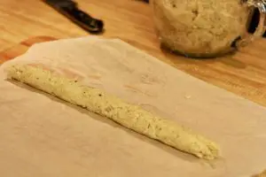 grated potato formed into a tube placed on wax paper