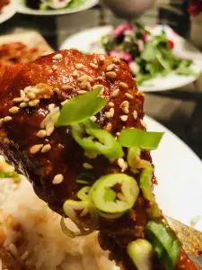 Korean Baked chicken with green onions and sesame seeds