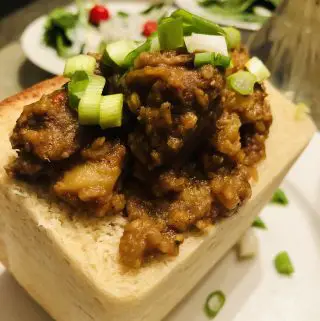 Bunny Chow and salad in the background