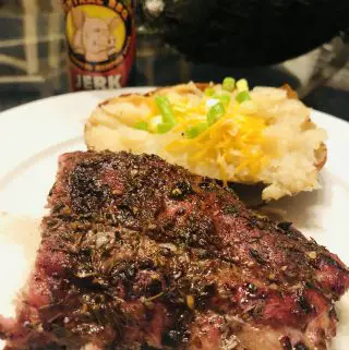 Baby back pork ribs with baked potato and Central BBQ Jerk Seasoning