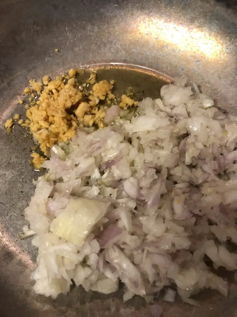 minced shallot, onion, and garlic in a pan with olive oil