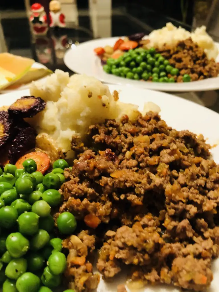 2 bowls of Mince and tatties served with peas and carrots