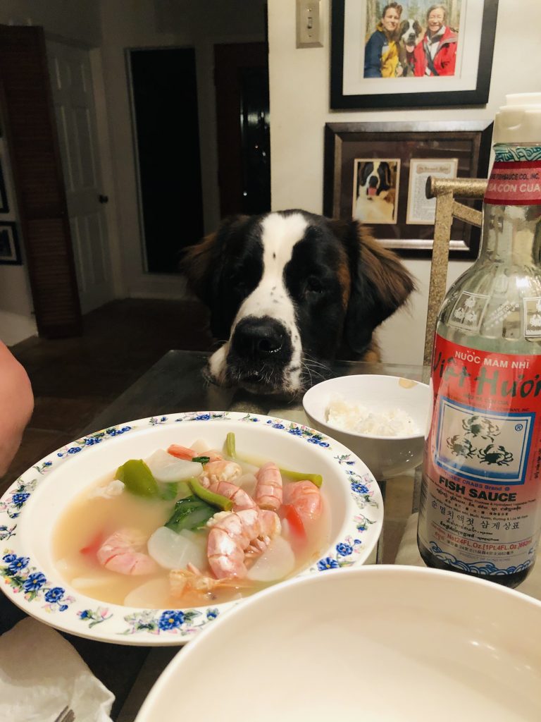 Toby and prawn sinigang with fish sauce and a bowl of rice 