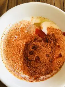 buttermilk and spices in a mixing bowl