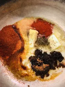 Butter and spices in a small saucepan