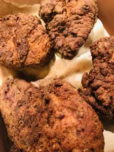 Fried Chicken draining on paper towels