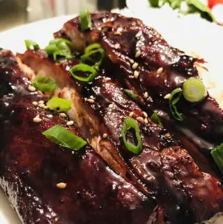 Chinese BBQ Spareribs garnished with green onions