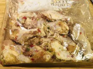 chicken drumettes and marinade in a large plastic bag