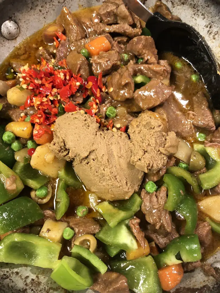Beef caldereta with vegetables, Thai chilis, and liver spread