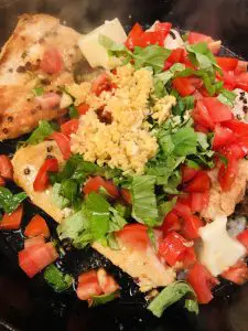Chicken breasts with garlic, basil, tomatoes