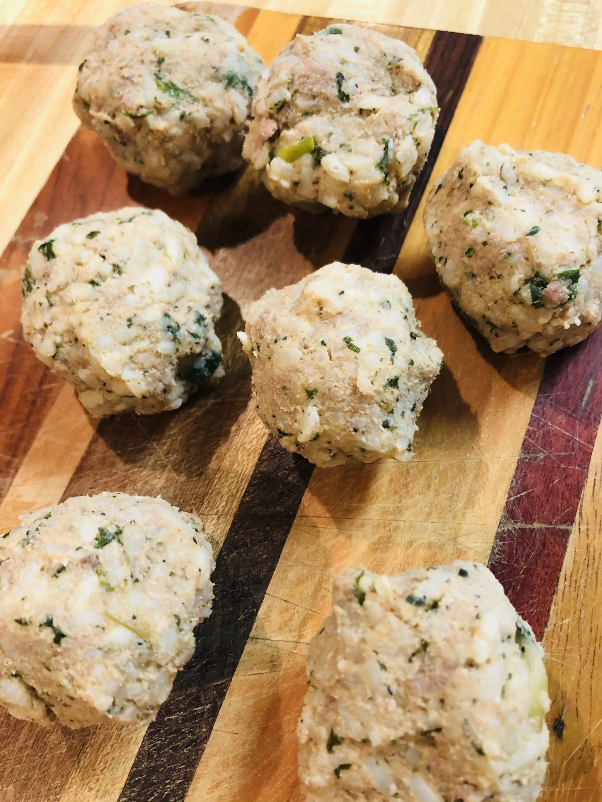 Boudin balls on a wooden board