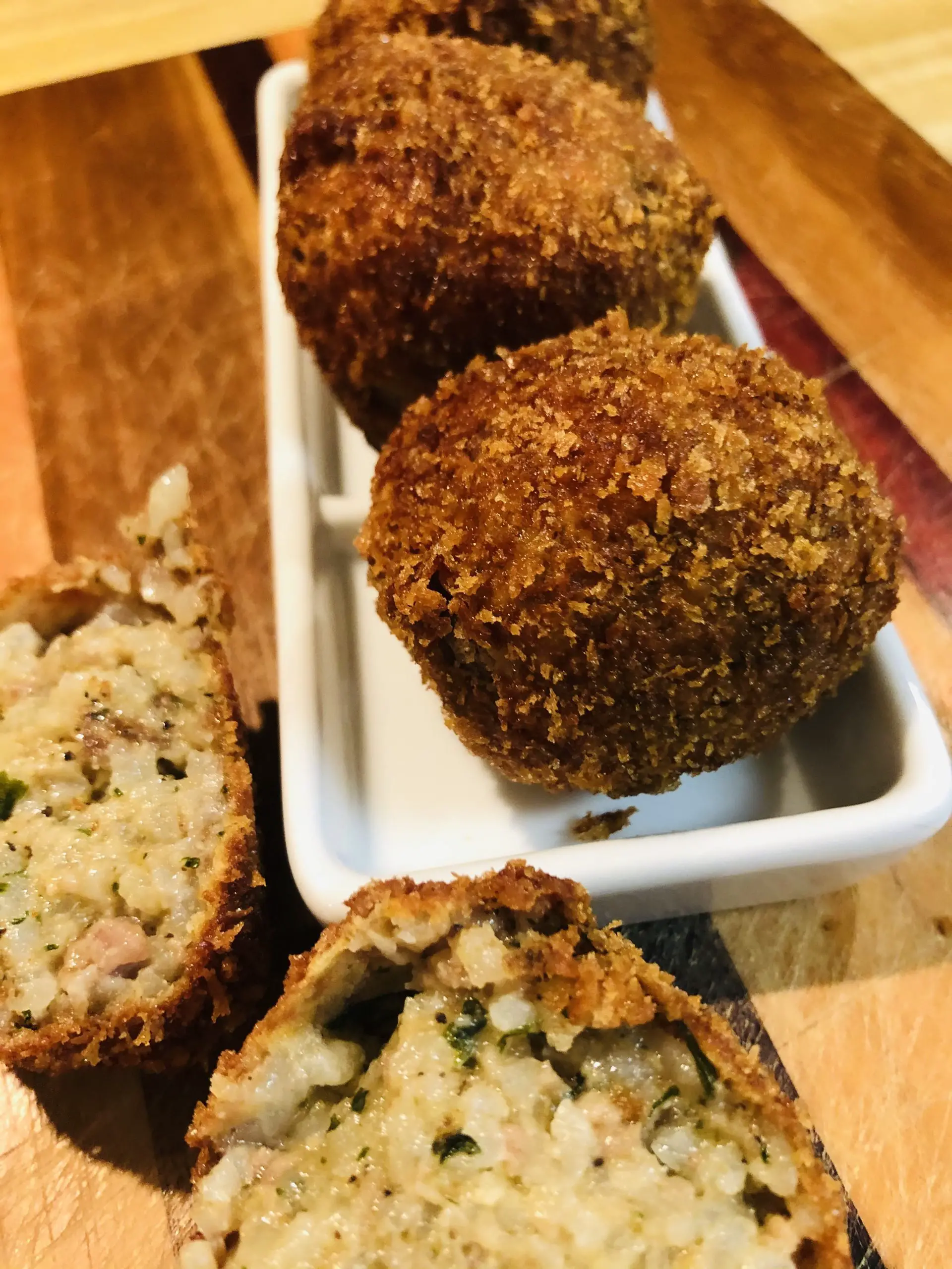 Boudin Balls on a white serving tray