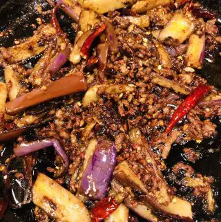 Sichuan Eggplant in a cast iron pan