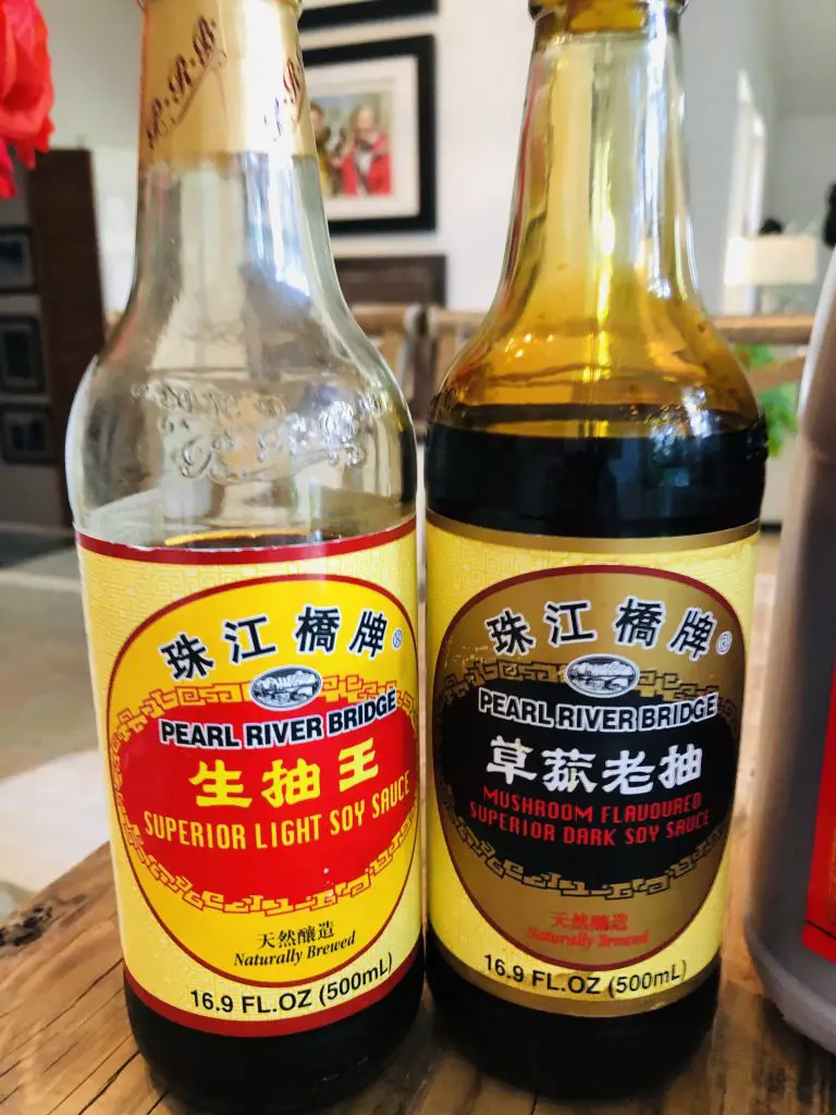 A bottle of dark soy sauce and light soy sauce