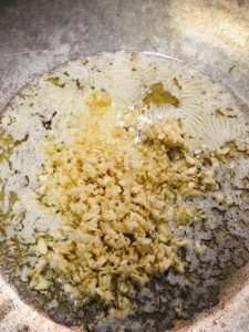 Butter and minced garlic in a skillet