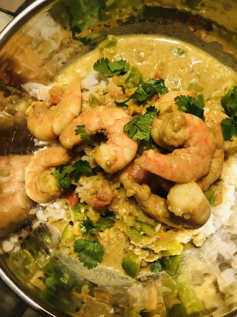 Coconut Curry Shrimp served with rice in a bowl