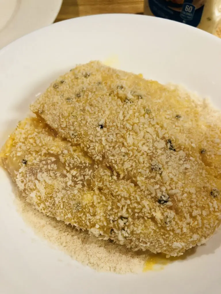 Cod dredged in flour dipped in egg then coated with panko