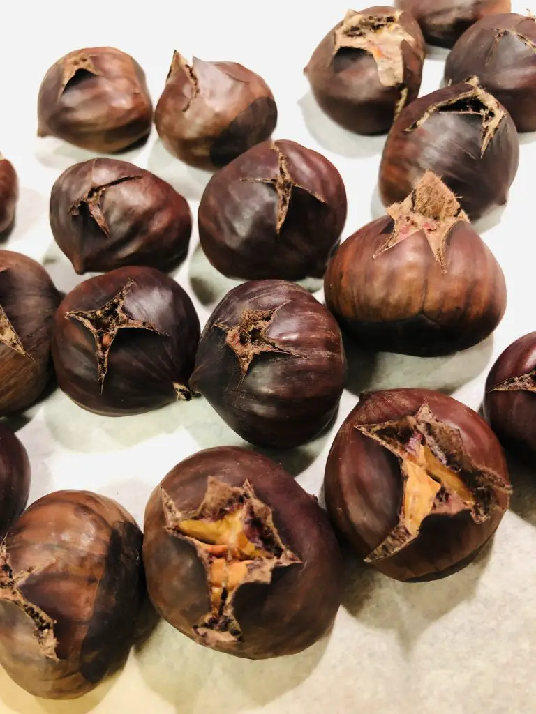 roasted chestnuts on parchment paper