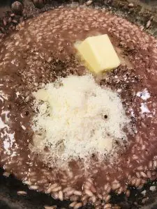 Amarone Red Wine Risotto with butter, pepper, and grated Parmigiano Reggiano