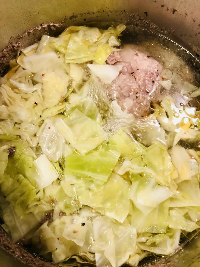 Cabbage and corned beef cooking in a stockpot