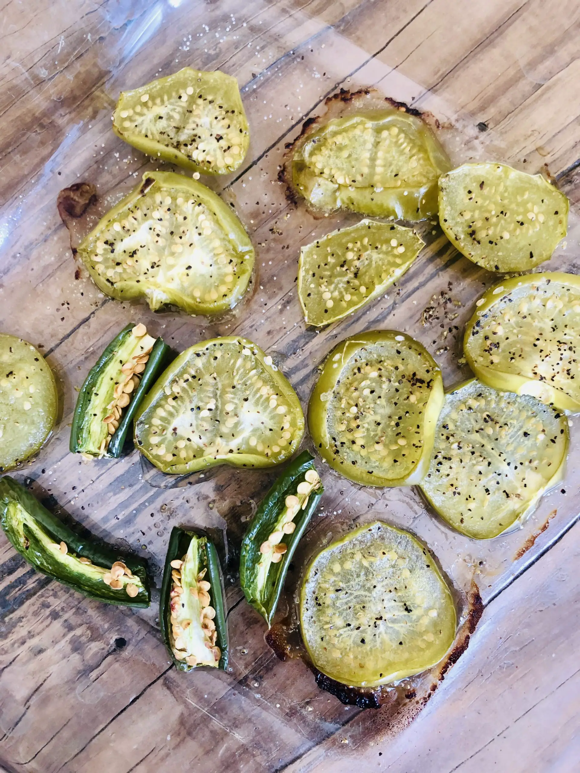 Roasted slices of tomatillo and serrano pepper