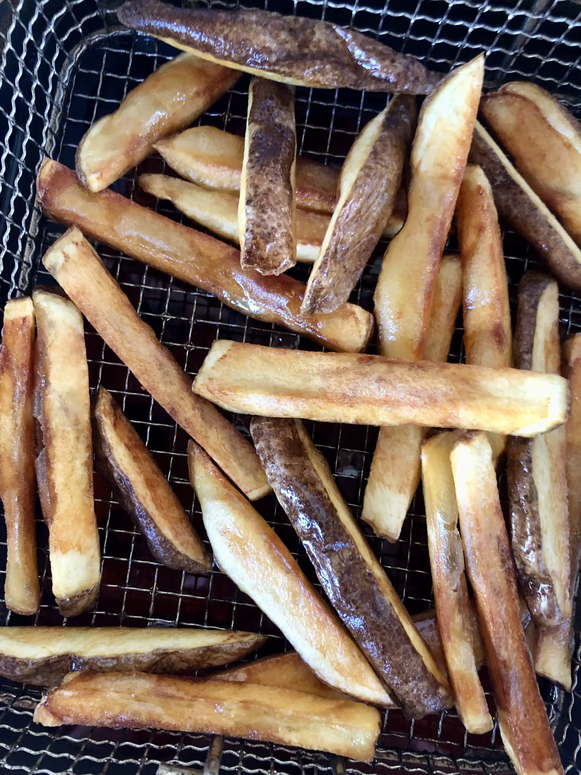 french fries in a fryer