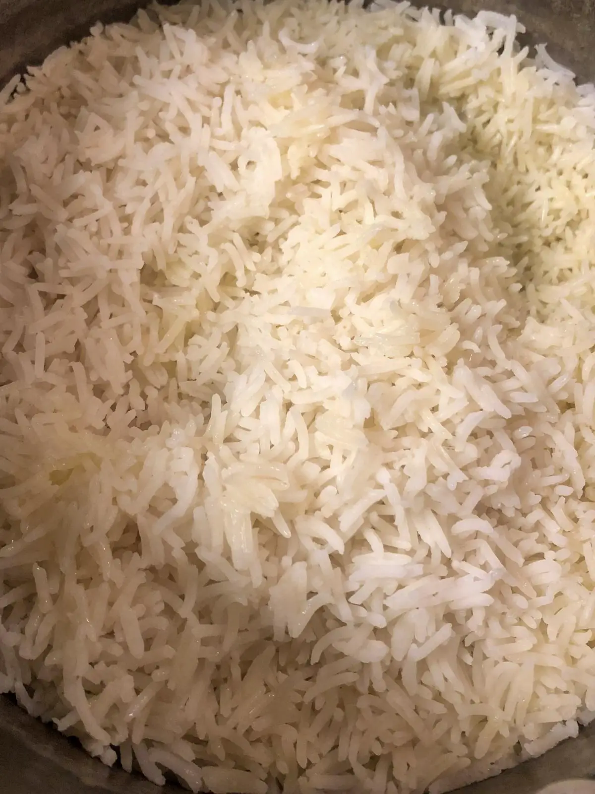 Basmati rice which has been cooked in a pot.