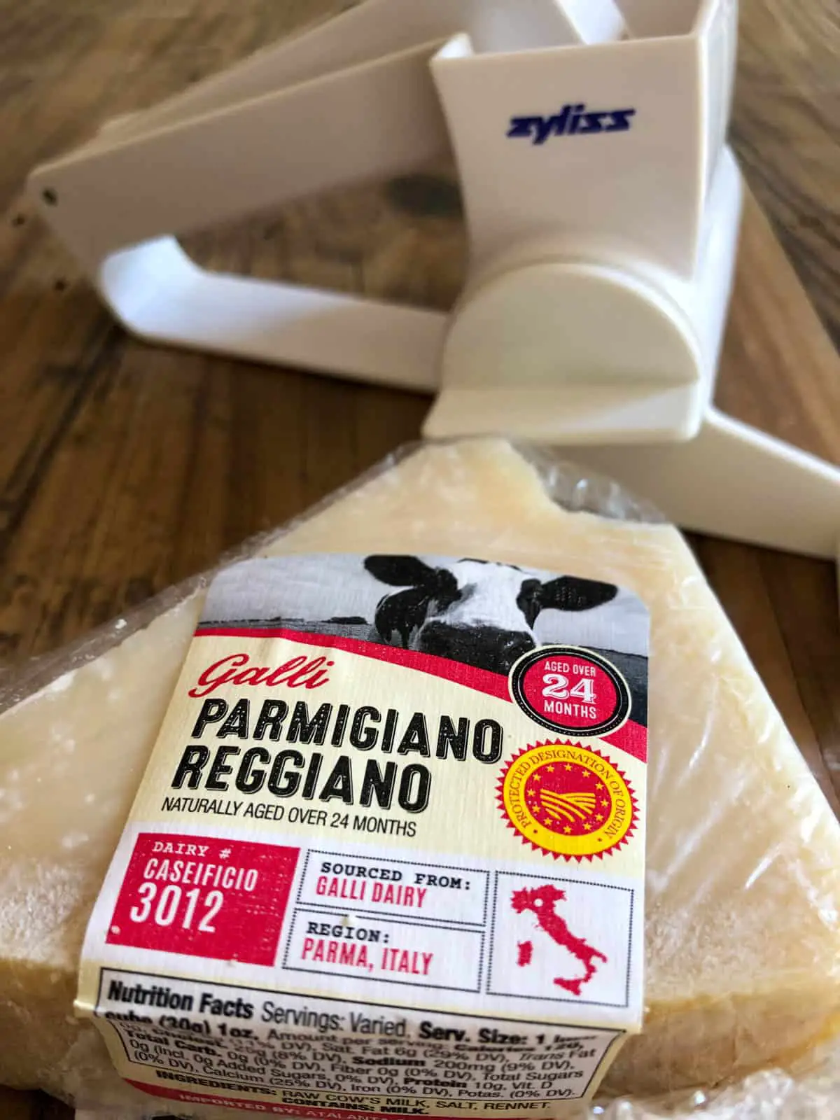Zyliss cheese grater and block of Parmigiano reggiano