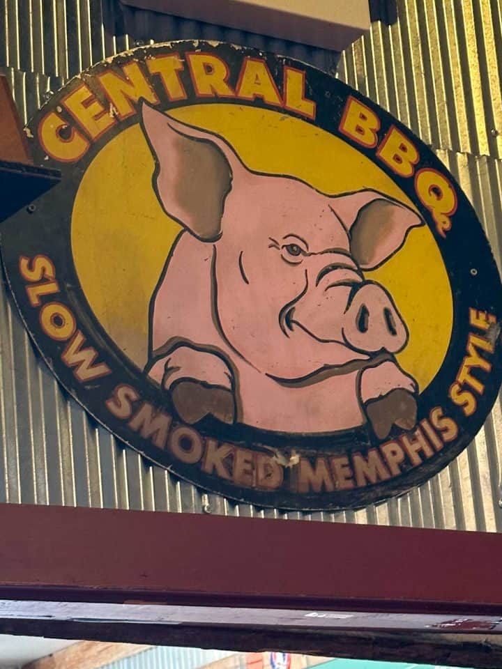 The Central BBQ Sign featuring a pig and the words "Slow Cooked Memphis Style."
