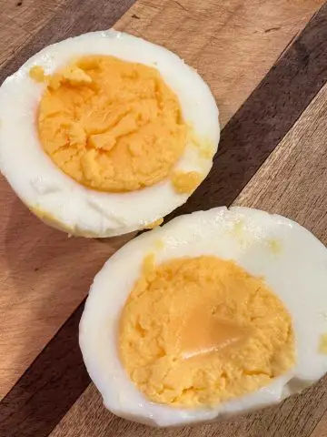 2 halves of a hard boiled egg.