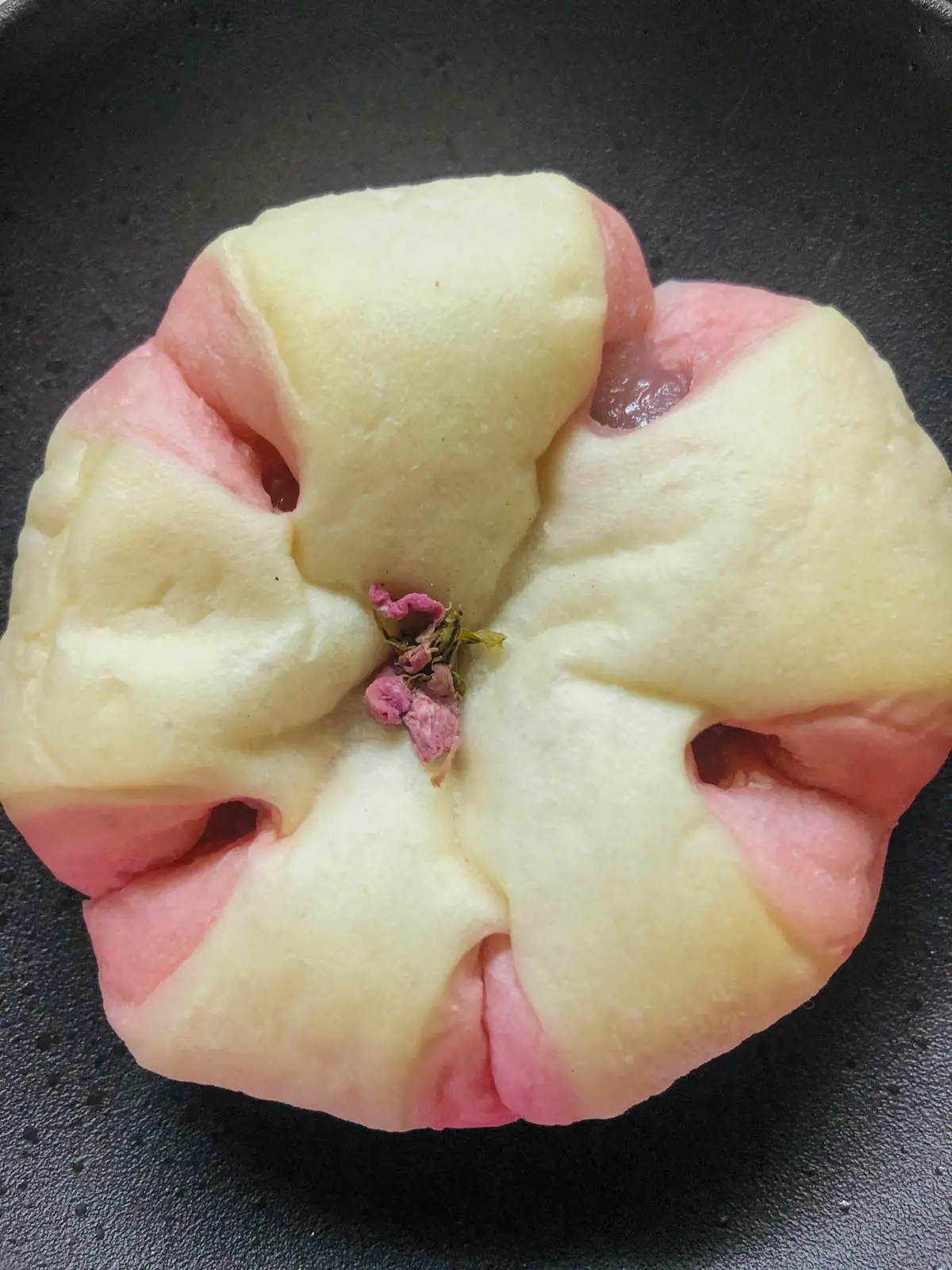 A sakura pastry or pastry that looks like a cherry blossom. 