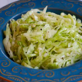 Middle Eastern Style Cabbage Salad in a blue dish.