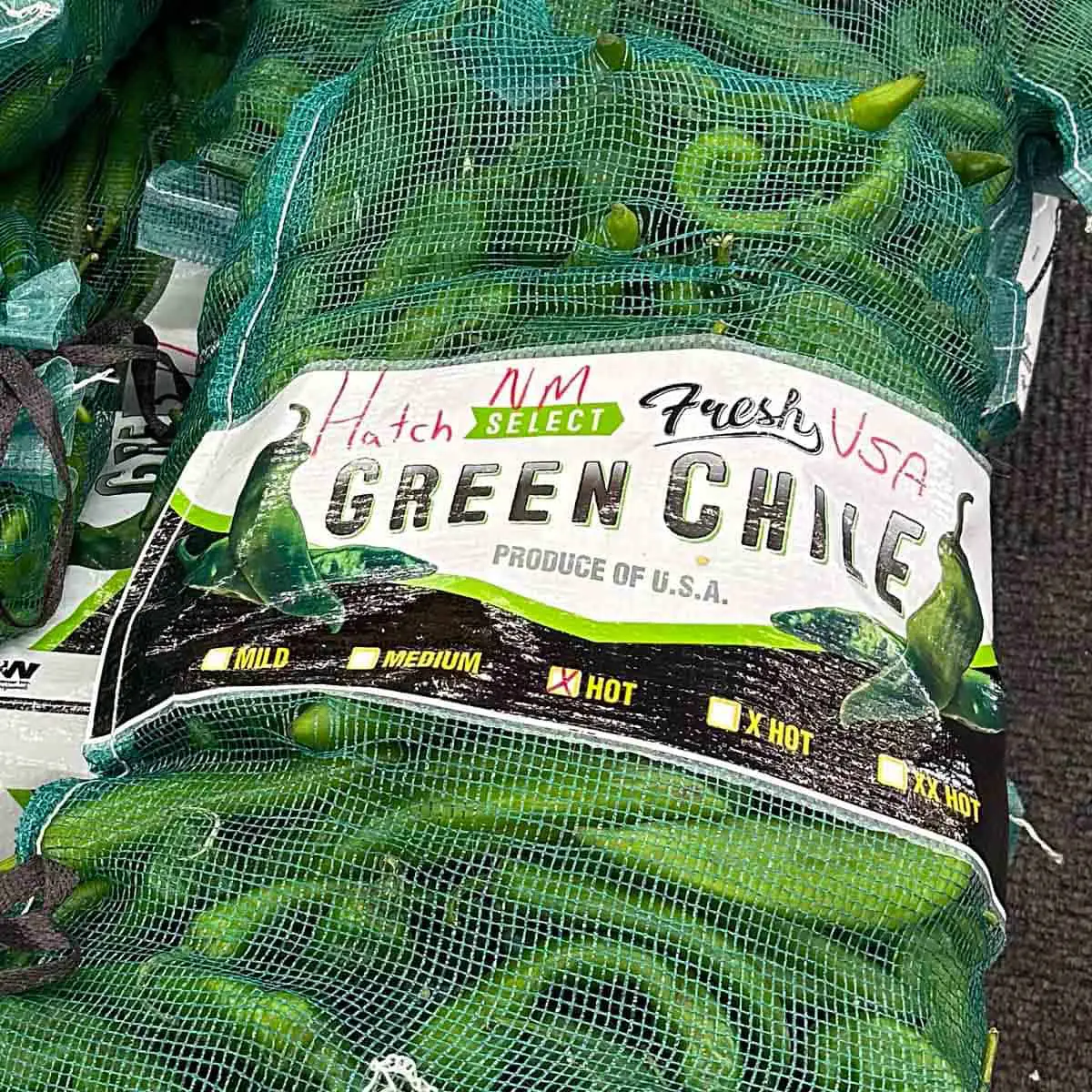 A large bag containing Hatch Green Chiles.