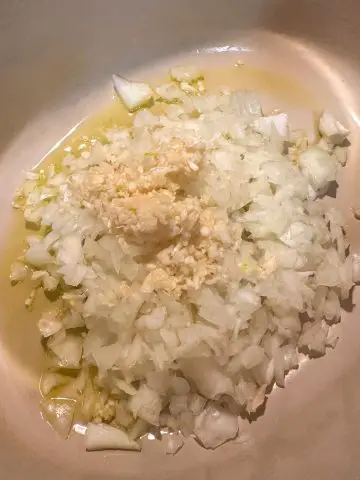 Diced onion, minced garlic and olive oil in a Dutch oven.