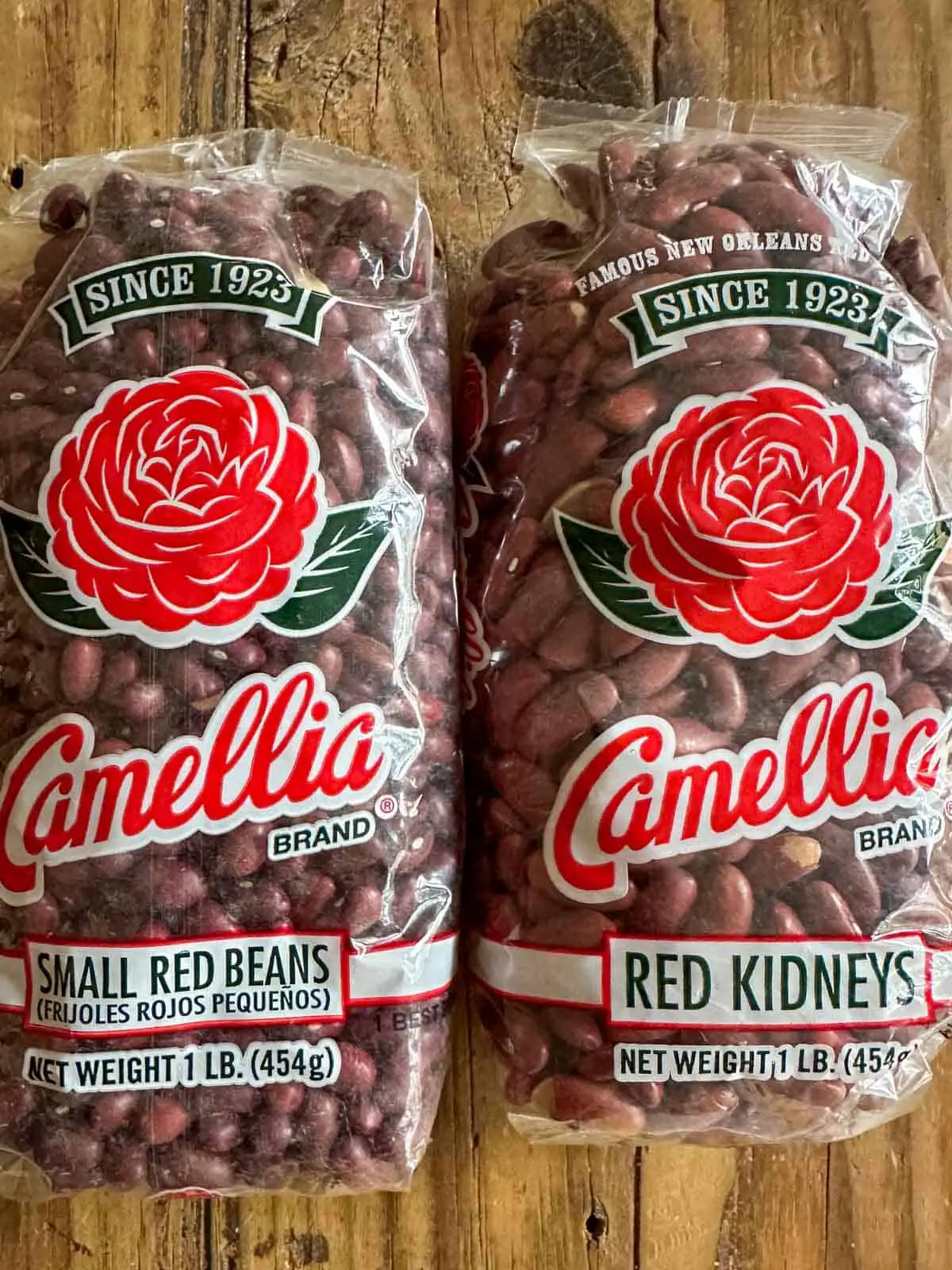 A package of Camellia Small Red Beans next to a package of Camellia Red Kidney beans.