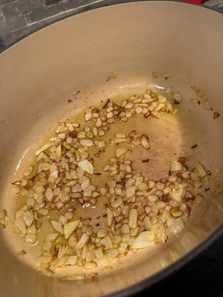Browned chopped onions in oil in a Dutch oven.