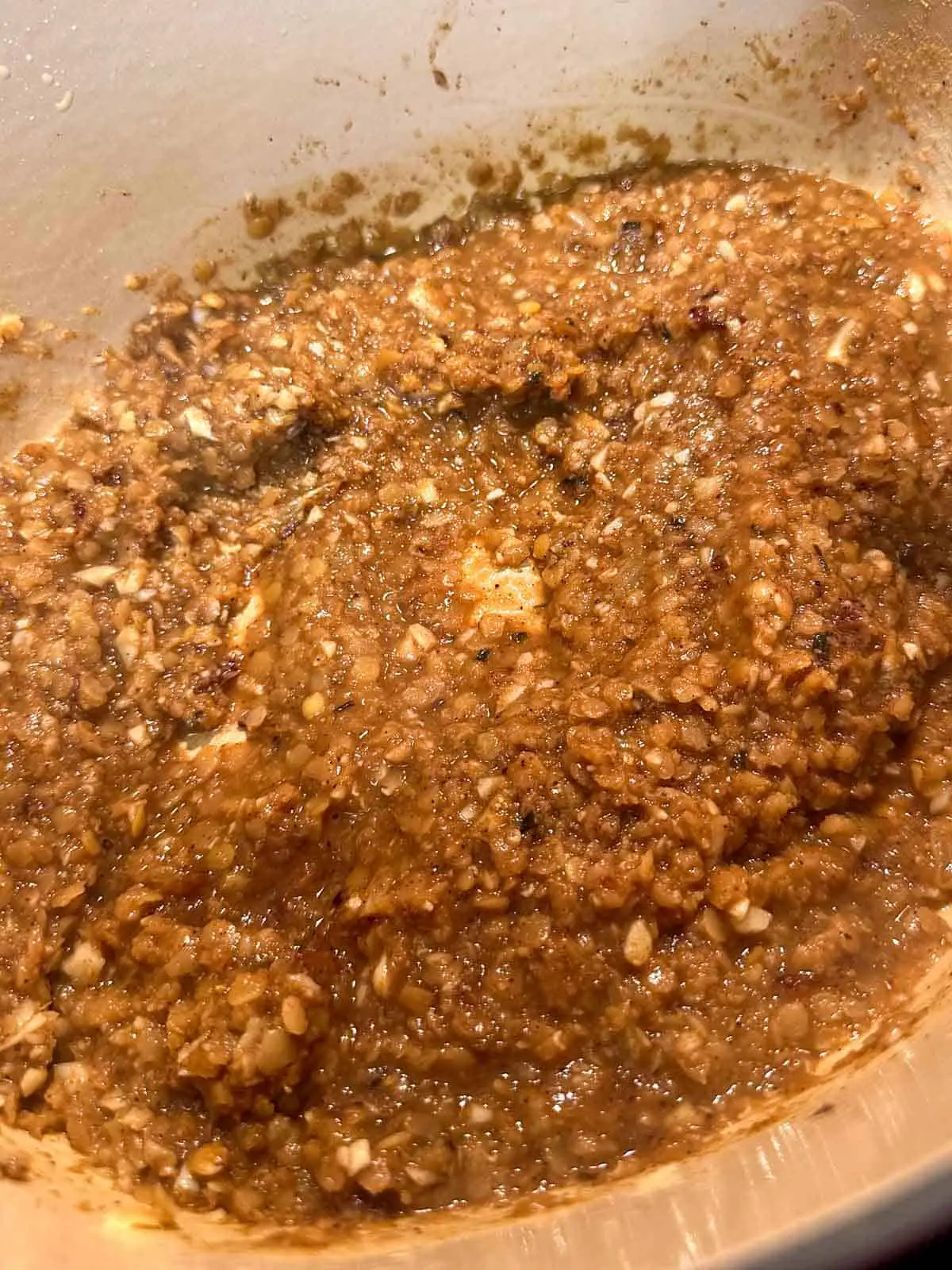 Red split lentils cooked with minced garlic, chopped onions, and Berbere spice.